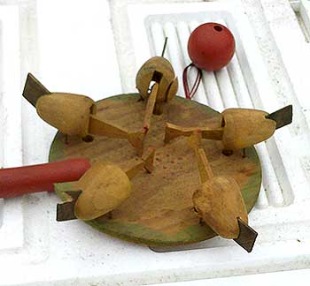 A pecking chicken paddle toy – Auction Finds