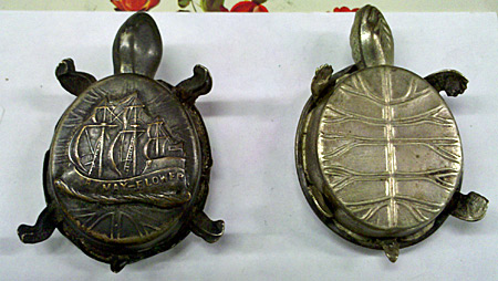 Guessing the function of a brass turtle – Auction Finds