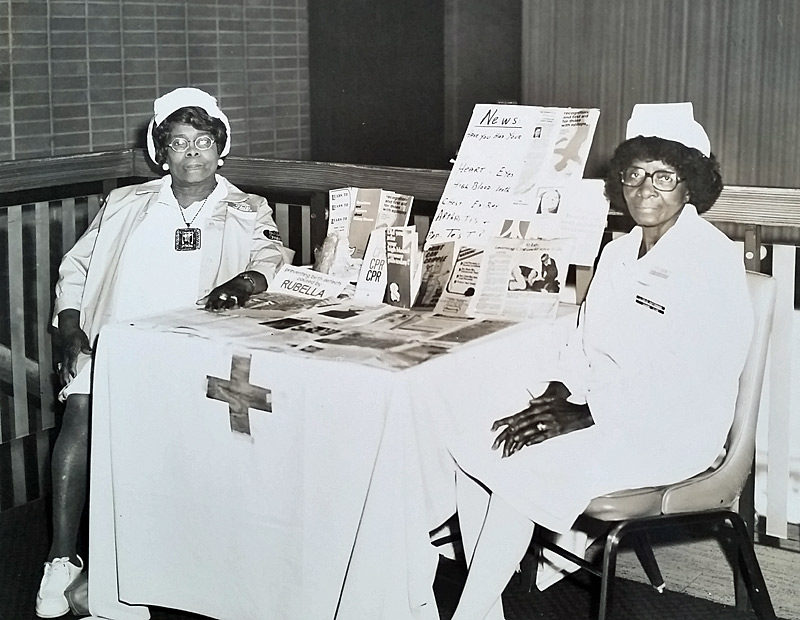 Photo by black photographer of two African American nurses by Jimmy Baynes, Cleveland.