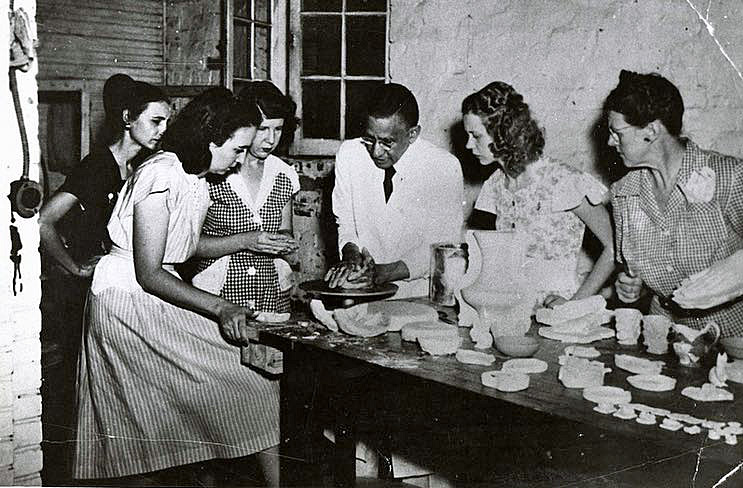 Artist Isaac Scott Hathaway with ceramics students at the Alabama Polytechnic Institute, 1947.