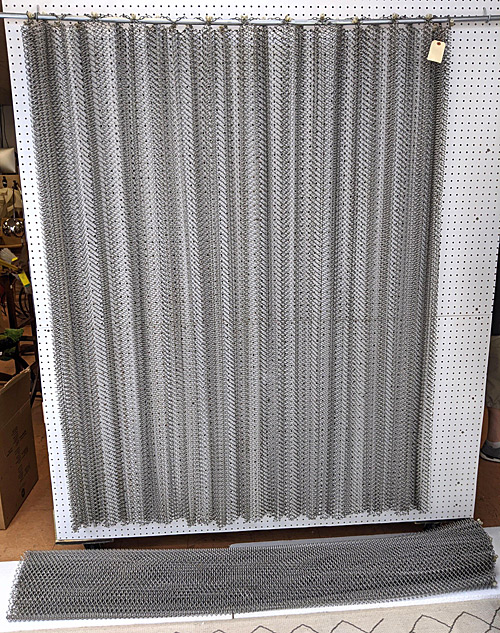 Steel mesh curtains that could be used as room dividers. 