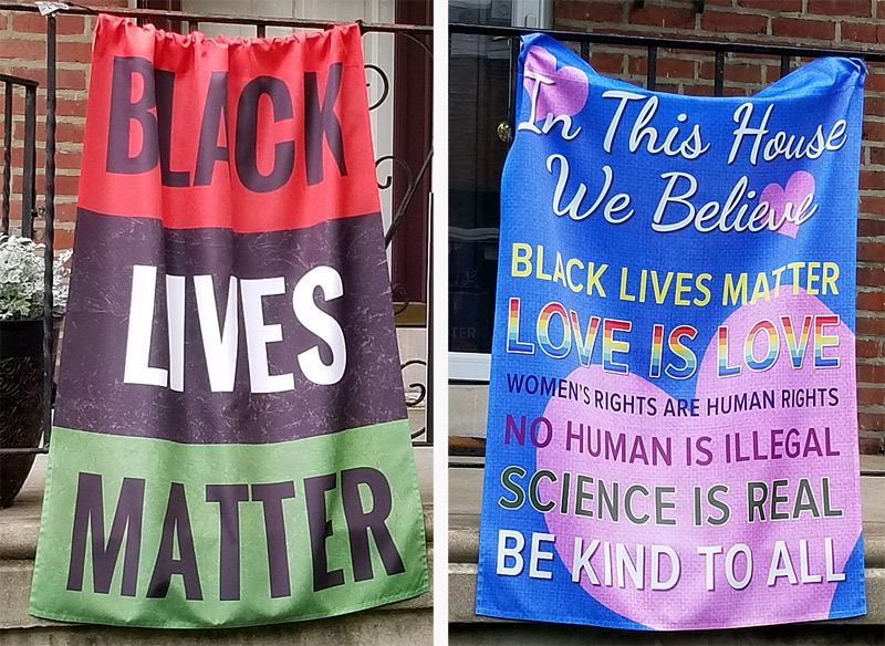 "Black Lives Matter" banners. The one at right expands the message. 