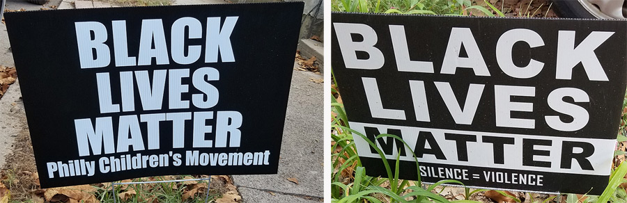 Two "Black Lives Matter" yard signs. 