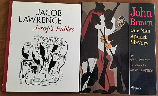 Two children's books with illustrations from Jacob Lawrence's series. 