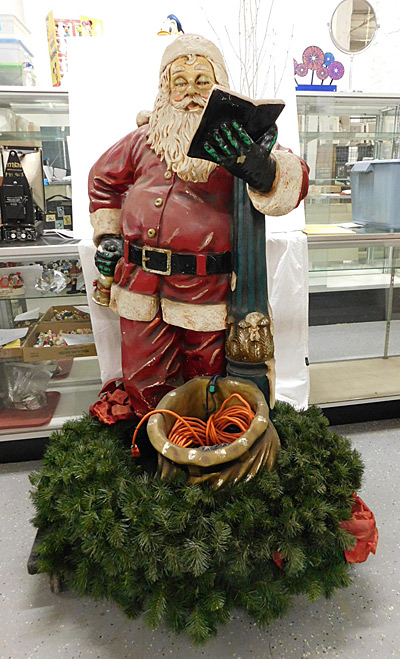 Hand-painted department-store Santa for sale at auction.