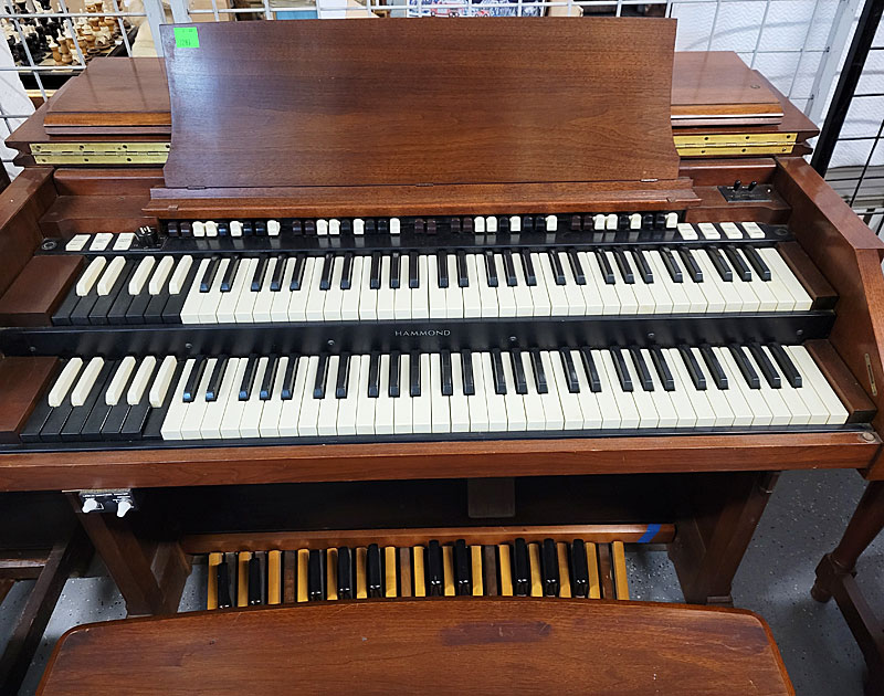 A Hammond organ owned by jazz organist/producer Luther Randolph. Several people played it to test it out. 