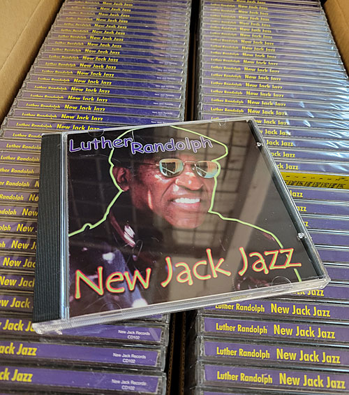 A box of jazz organist/producer Luther Randolph's CDs from the 1990s.