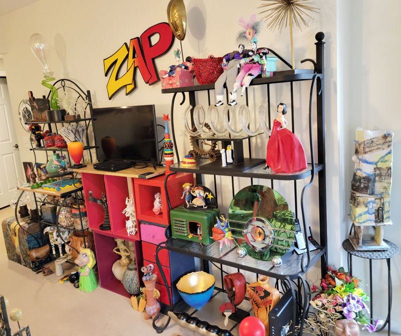 A wall of items at the home of Susan F. Cobin. The ZAP sign sparked childhood memories.